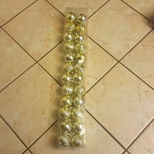 Set of 24 shatterproof gold Christmas ornaments